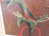 a painting of a dragon sitting on a red chair