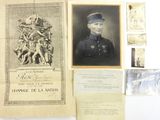an old photograph of a man in a military uniform next to a picture of a statue