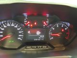 a close up of a car dashboard with various gauges