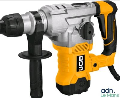 a close up of a drill with a hammer attached to it