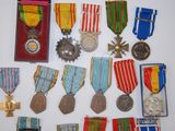 many medals and medals on display on a table