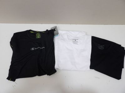 three t - shirts are laid out on a white surface