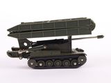 a toy army vehicle with a missile on top of it