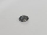 a black diamond on a white surface