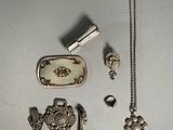 a lot of silver items that are on the table