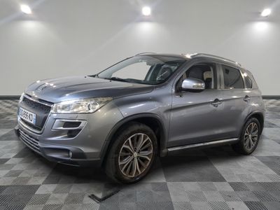 the silver suv is parked on a checkered tile floor