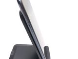 a cell phone that is sitting on top of a stand