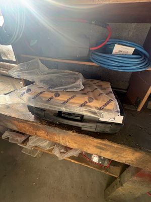 an image of a workbench with tools and supplies on it