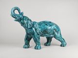 blue elephant figurine on a white background