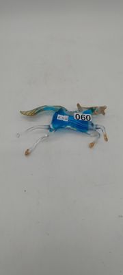 an image of a small plastic object on a white surface