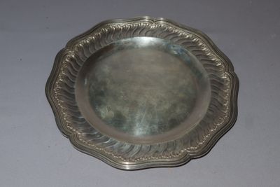 a silver plate that is sitting on a table