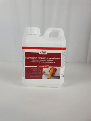 a gallon of liquid sitting on top of a white table