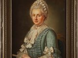portrait of a young woman in a blue dress and bonnet