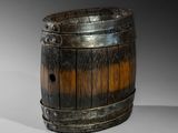 a wooden barrel that is sitting on a table