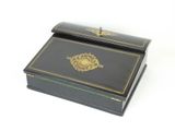 an image of a black box with a gold design on it