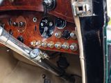 a close up of a dashboard of an old car