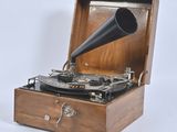 a wooden box with a record player inside of it