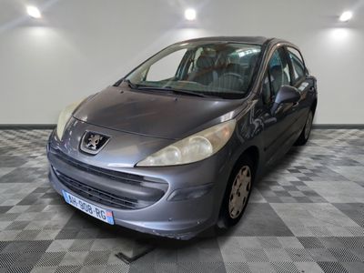a picture of a silver car parked in a garage
