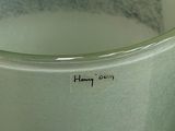 a close up of a cup with a sticker on it
