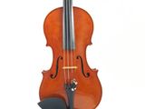 a close up of a violin with a bow on a white background