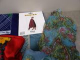 a picture of a pile of clothing on a couch