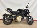 a picture of a motorcycle parked in a garage