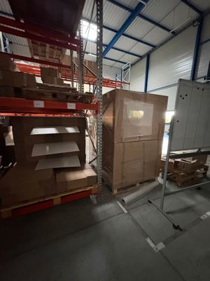 a room with a lot of boxes and shelves