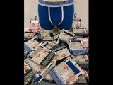 a picture of a pile of money with a man ' s underwear on it