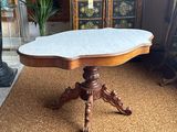 an image of a table with a marble top