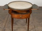 an image of a small table with a marble top
