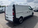 a white van that is parked in a parking lot