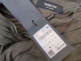 an image of a label on the back of a dress