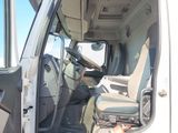a white truck with the driver ' s seat up and the driver ' s seat down