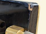 a close up of a door handle with a lock on it