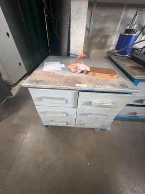 an image of a kitchen counter with a lot of boxes on top of it