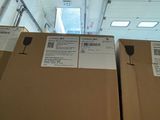 boxes are stacked on top of each other in a warehouse