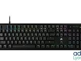the keyboard is black and has blue keys on it