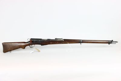 a rifle with a wooden barrel on a white background