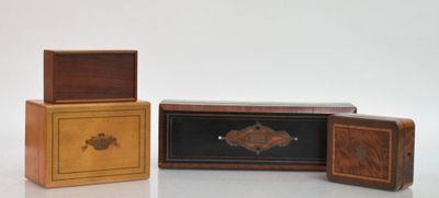 three wooden boxes that are sitting next to each other