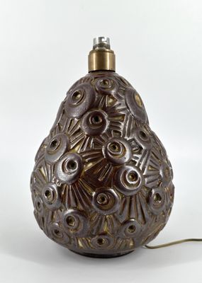 a brown lamp that is sitting on a table
