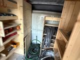 an image of a garage with a lot of tools in it