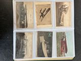 a picture of a collection of old photographs on a table