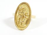 a close up of a gold ring with an image of a man on a horse