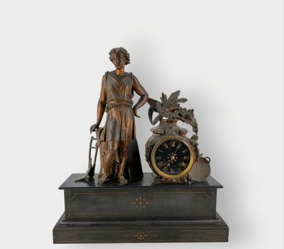 JAPY FRÈRES. Pendule en régule à patine brune figurant un je…