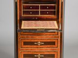an image of a small cabinet with drawers and a marble top