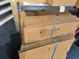 many boxes stacked on top of each other in a warehouse
