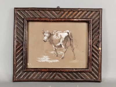 tableau représentant une vache, encadré et accroché au mur