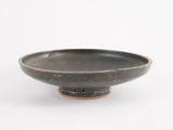 bowl with black glaze glaze on a white background