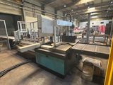 an image of a large machine in a factory with lots of machinery