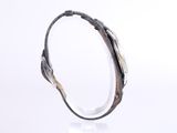 silver bangle bracelet with black and gold details